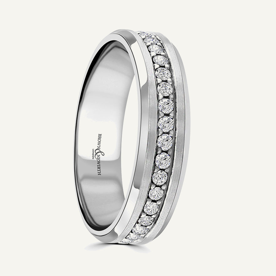 Bevel Edged Flat Top With Grains Set Centre Round Brills Diamond Eternity Ring
