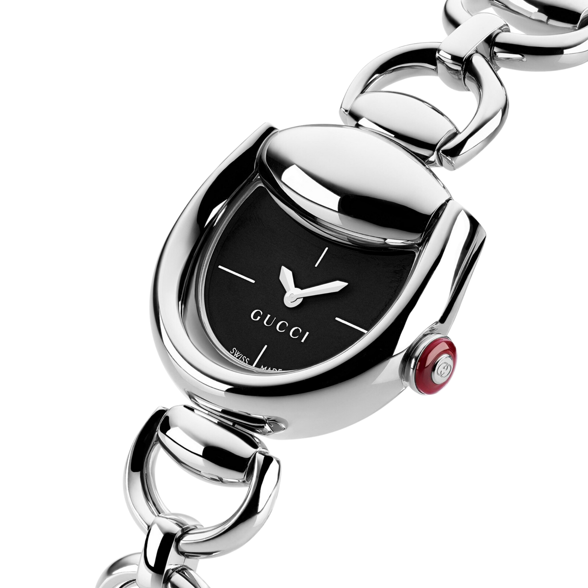 Close-up angled view of the Gucci stainless steel bracelet watch featuring a black minimalist dial, sculptural rounded case, polished silver finish, and red enamel crown.