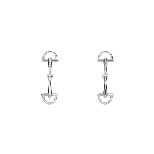 Front view of the Gucci Staffa earrings in polished 925 sterling silver, showcasing the articulated stirrup-inspired design and elegant drop silhouette