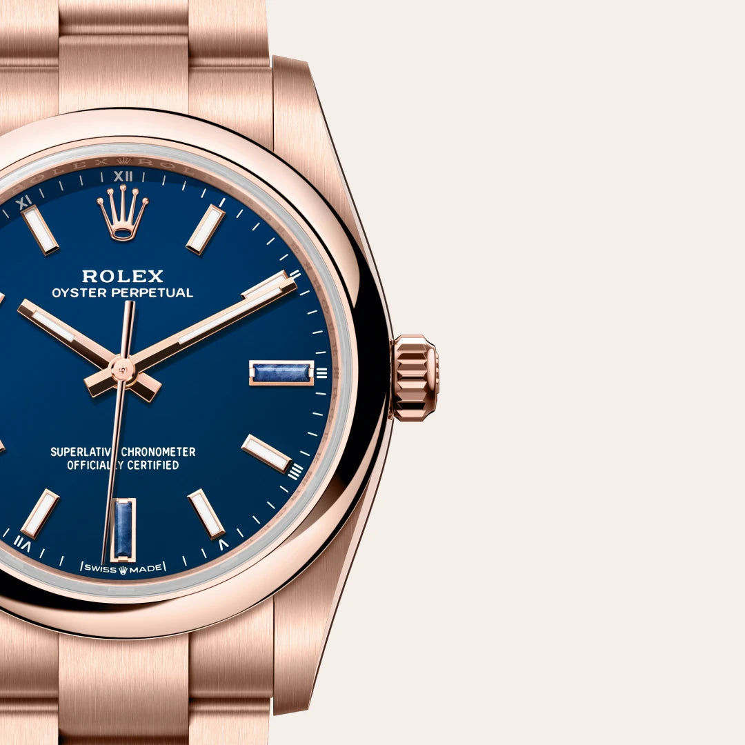Rolex Oyster Perpetual 34 in 18 ct Everose gold with a Blue stone dial, Domed bezel, Oyster, three-piece solid links bracelet