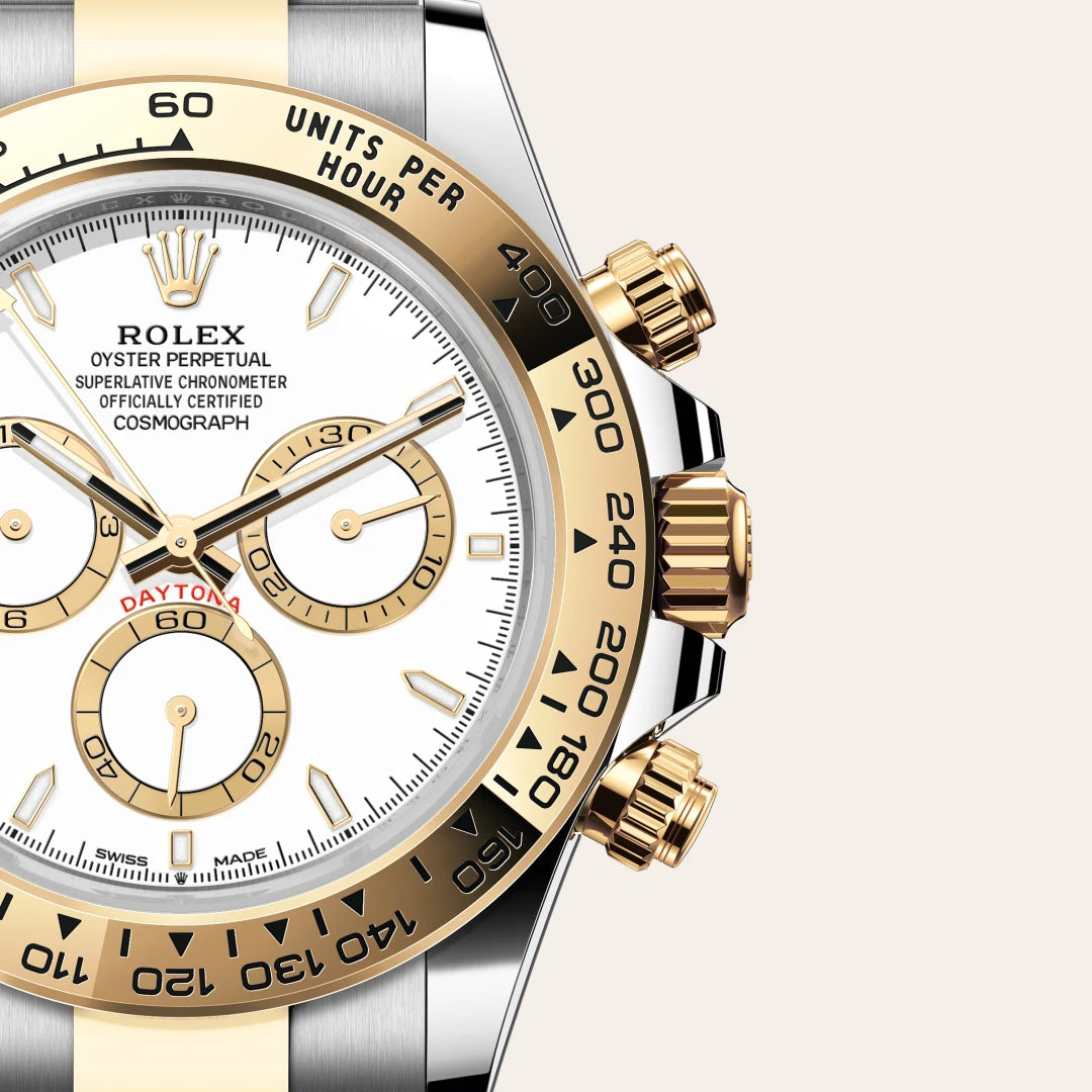Rolex Cosmograph Daytona in Yellow Rolesor - combination of Oystersteel and yellow gold with a White, golden counter rings dial, Fixed, with engraved tachymetric scale, in yellow gold bezel, Oyster, three-piece solid links bracelet