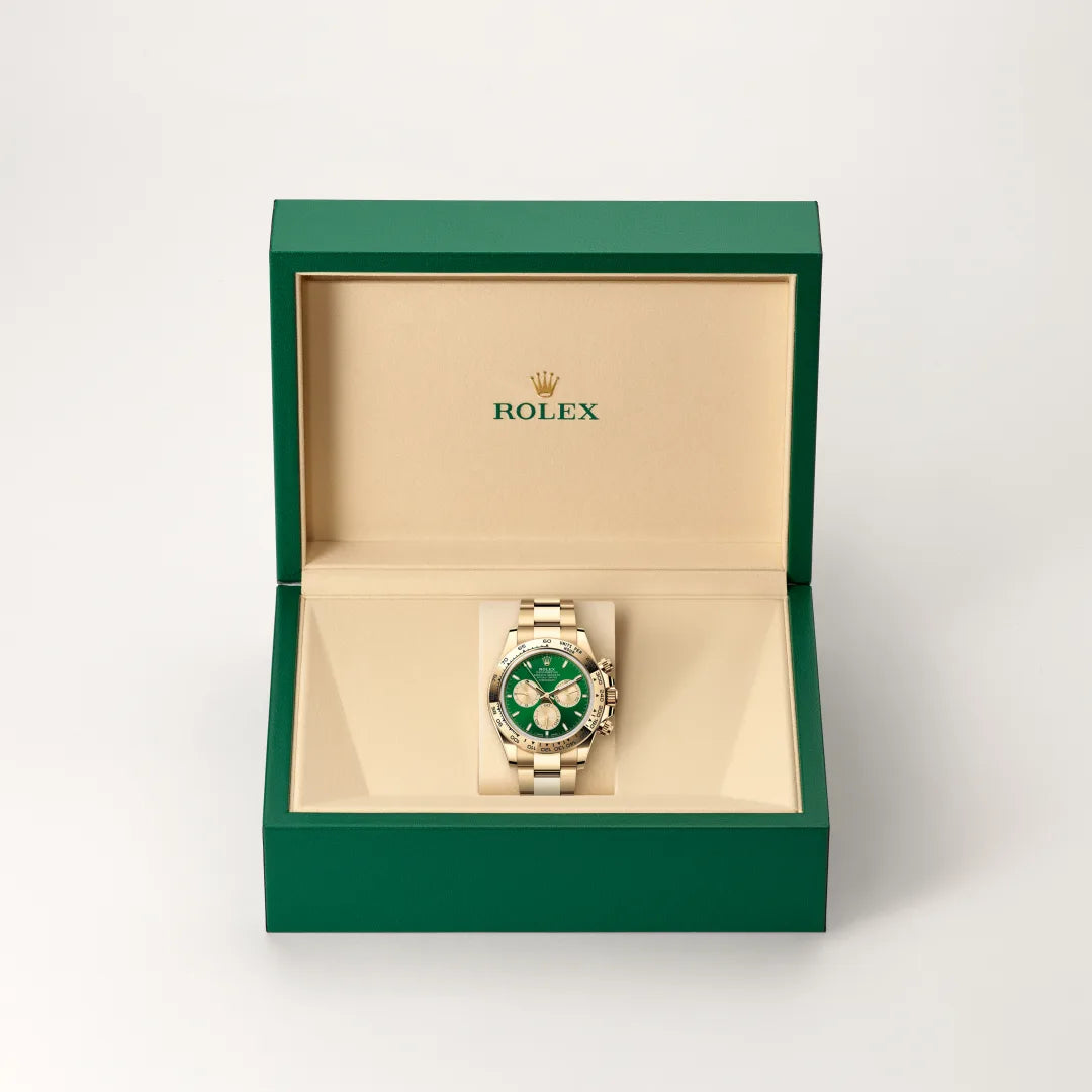 Rolex Cosmograph Daytona in 18 ct yellow gold with a Bright green and golden dial, Fixed, with engraved tachymetric scale, in 18 ct yellow gold bezel, Oyster, three-piece solid links bracelet