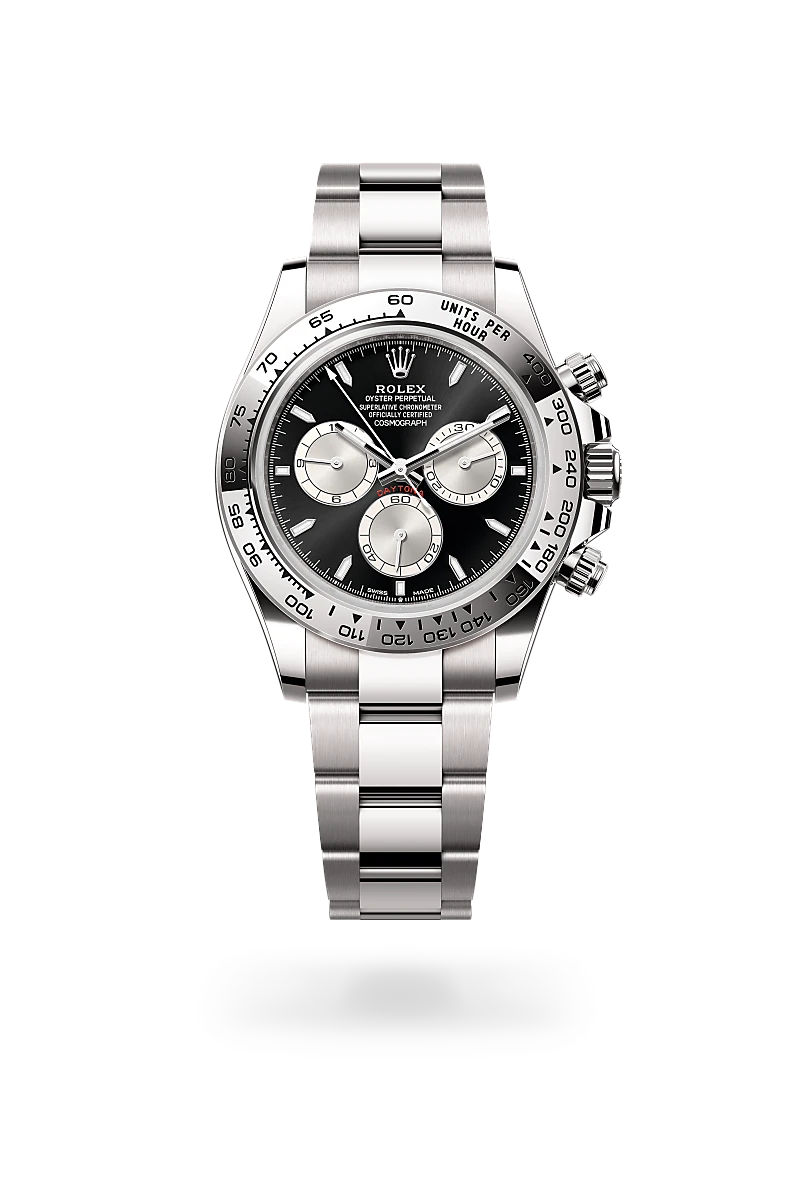 Rolex Cosmograph Daytona in 18 ct white gold with a Bright black and steel dial, Fixed, with engraved tachymetric scale, in 18 ct white gold bezel, Oyster, three-piece solid links bracelet