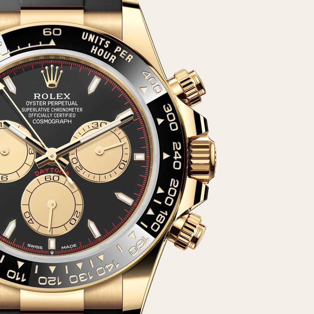 Rolex Cosmograph Daytona in 18 ct yellow gold with a Intense black and champagne-colour dial, Black monobloc Cerachrom bezel in ceramic with moulded tachymetric scale bezel, Oysterflex bracelet