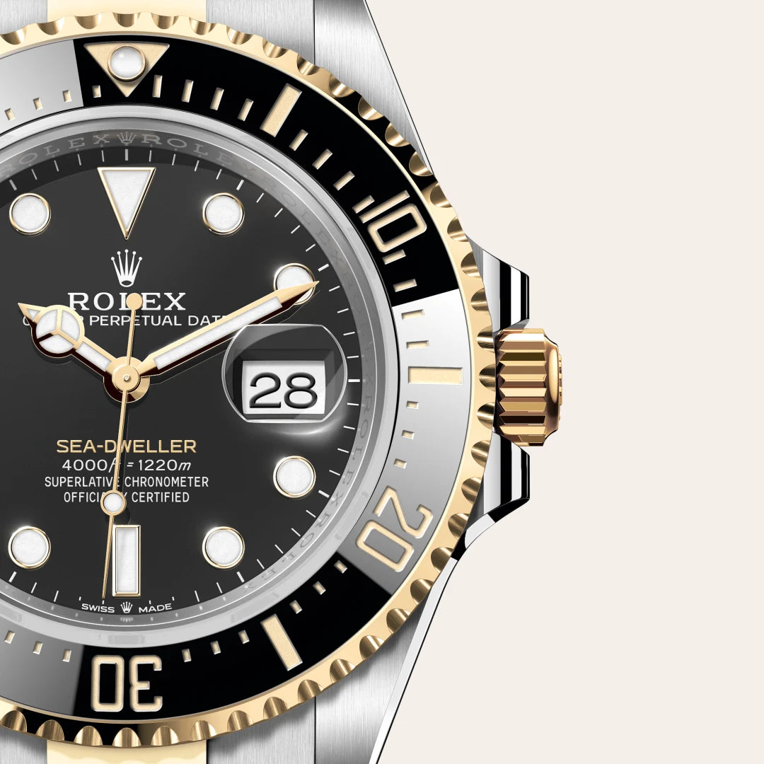 Rolex Sea-Dweller in Yellow Rolesor - combination of Oystersteel and yellow gold with a Intense black dial, Unidirectional rotatable 60-minute graduated, scratch-resistant Cerachrom insert in black ceramic, numerals and graduations coated in gold bezel, Oyster, three-piece solid links bracelet
