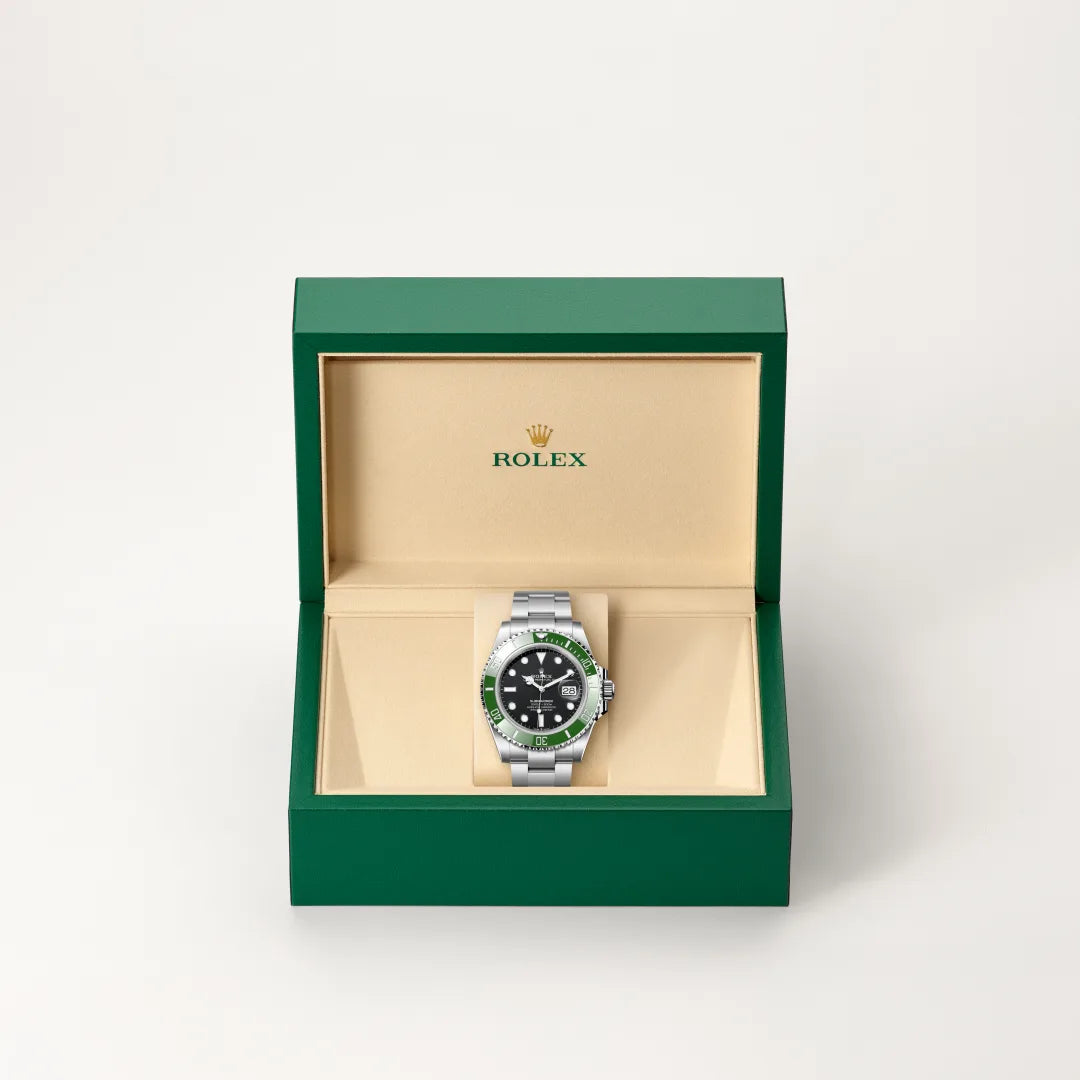 Rolex Submariner Date in Oystersteel with a Black dial, Unidirectional rotatable 60-minute graduated, scratch-resistant Cerachrom insert in green ceramic, numerals and graduations coated in platinum bezel, Oyster, three-piece solid links bracelet