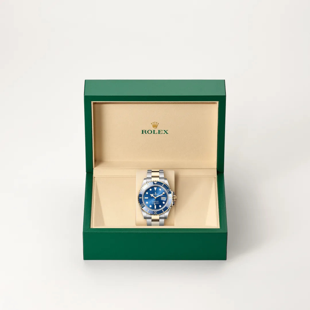Rolex Submariner Date in Yellow Rolesor - combination of Oystersteel and yellow gold with a Royal blue dial, Unidirectional rotatable 60-minute graduated, scratch-resistant Cerachrom insert in blue ceramic, numerals and graduations coated in gold bezel, Oyster, three-piece solid links bracelet