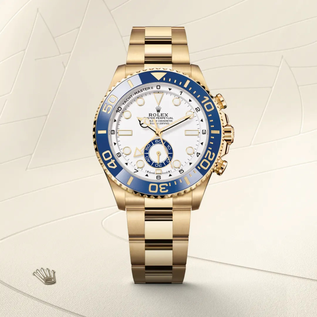 Rolex Yacht-Master II in 18 ct yellow gold with a White dial, Bidirectional rotatable 60-minute graduated bezel with blue Cerachrom insert in ceramic. Moulded, recessed graduations and numerals coated with gold bezel, Oyster, three-piece solid links bracelet