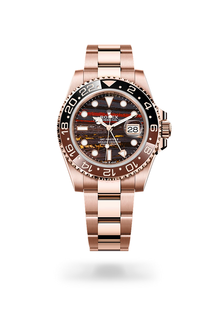 Rolex GMT-Master II in 18 ct Everose gold with a Tiger iron dial, Bidirectional rotatable 24-hour graduated bezel. Two-colour brown and black Cerachrom insert in ceramic, moulded numerals and graduations bezel, Oyster, three-piece solid links bracelet