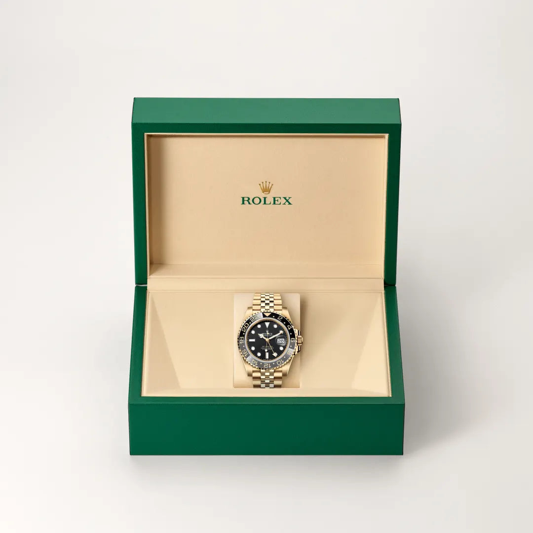 Rolex GMT-Master II in 18 ct yellow gold with a Black dial, Bidirectional rotatable 24-hour graduated bezel. Two-colour grey and black Cerachrom insert in ceramic, moulded numerals and graduations bezel, Jubilee, five-piece links bracelet