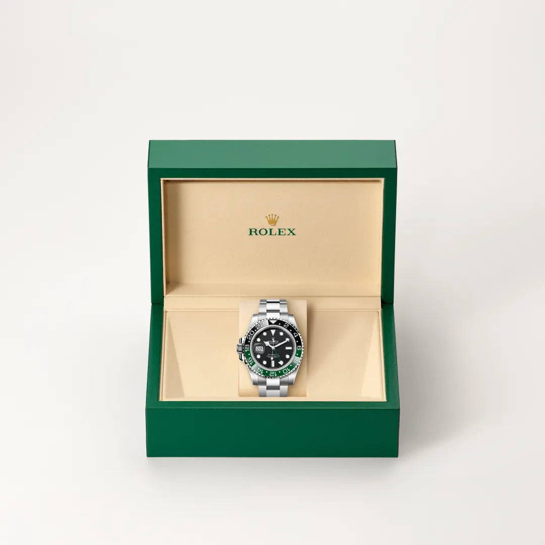 Rolex GMT-Master II in Oystersteel with a Black dial, Bidirectional rotatable 24-hour graduated bezel. Two-colour green and black Cerachrom insert in ceramic, moulded numerals and graduations bezel, Oyster, three-piece solid links bracelet