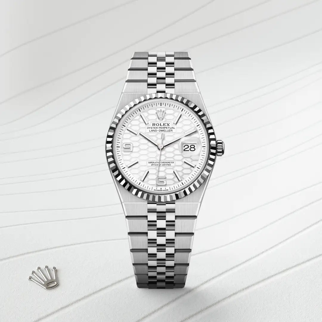Rolex Land-Dweller 36 in White Rolesor - combination of Oystersteel and white gold with a Intense white, honeycomb motif dial, Fluted bezel, Flat Jubilee, five-piece solid links bracelet