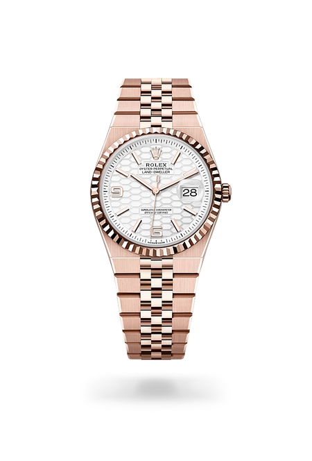 Rolex Land-Dweller 36 in 18 ct Everose gold with a Intense white, honeycomb motif dial, Fluted bezel, Flat Jubilee, five-piece solid links bracelet