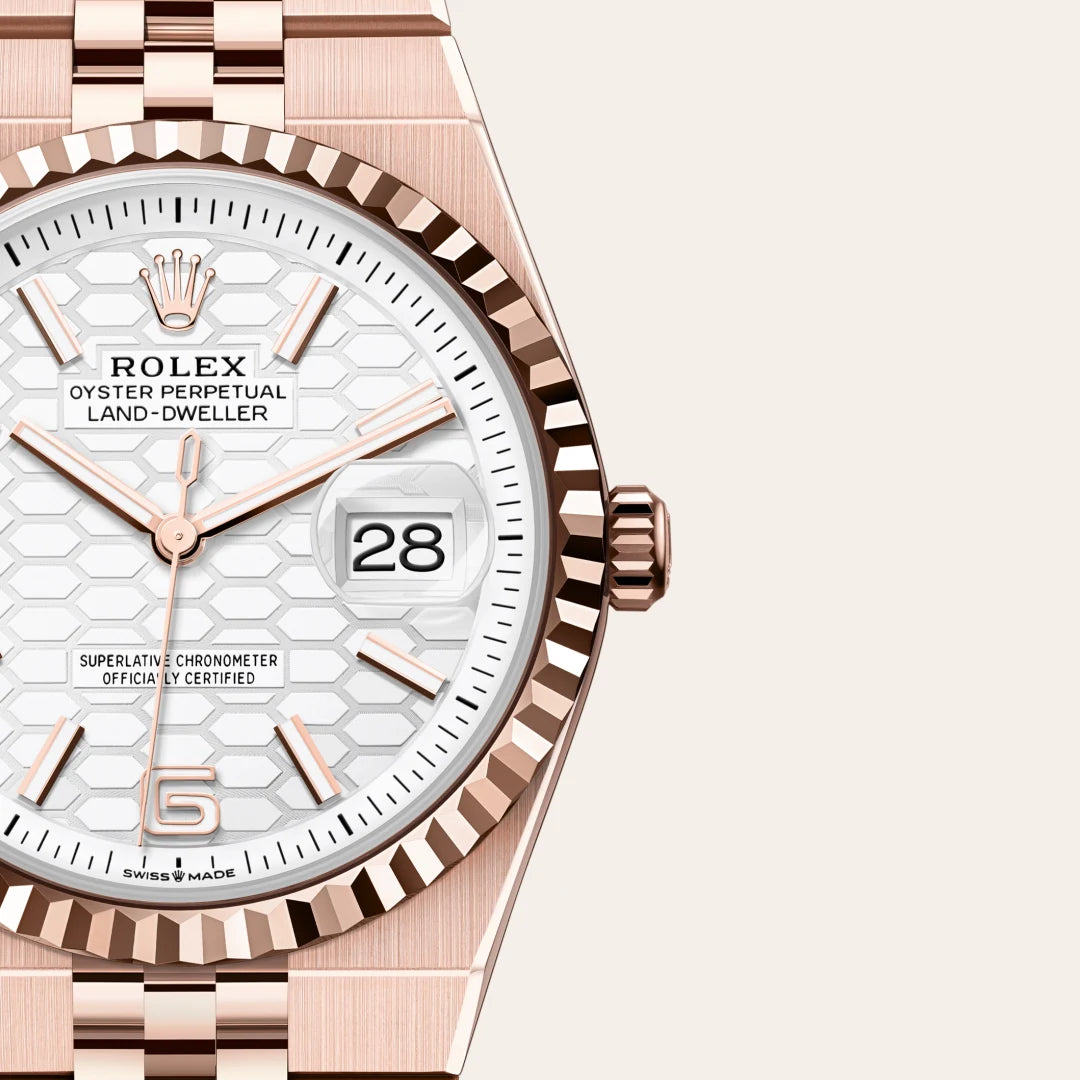 Rolex Land-Dweller 36 in 18 ct Everose gold with a Intense white, honeycomb motif dial, Fluted bezel, Flat Jubilee, five-piece solid links bracelet