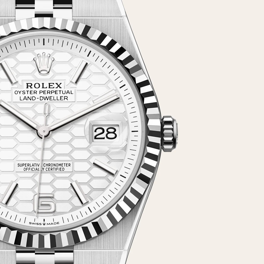 Rolex Land-Dweller 40 in White Rolesor - combination of Oystersteel and white gold with a Intense white, honeycomb motif dial, Fluted bezel, Flat Jubilee, five-piece solid links bracelet