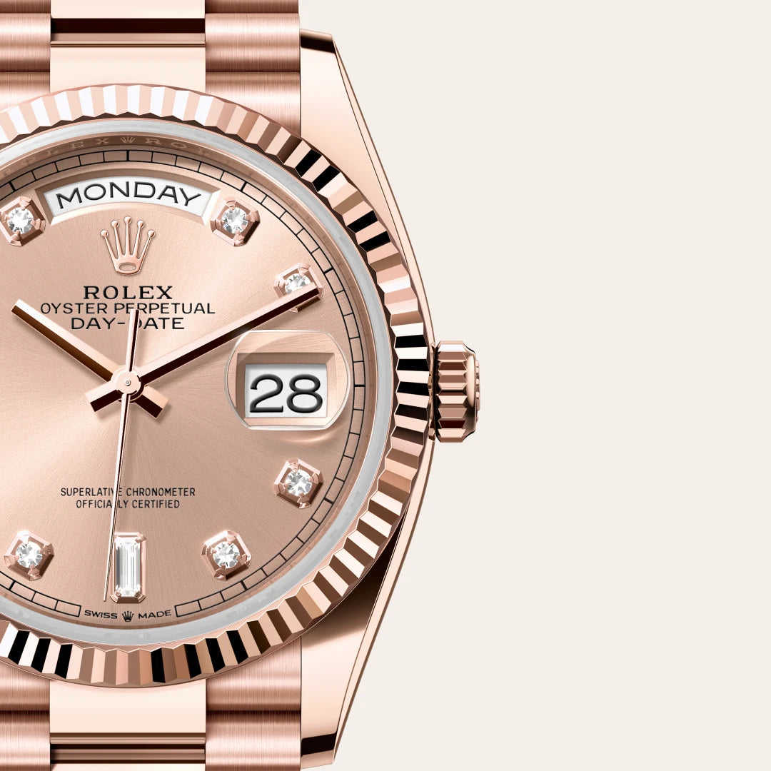 Rolex Day-Date 36 in 18 ct Everose gold with a Rosé-colour set with diamonds dial, Fluted bezel, President, semi-circular three-piece links bracelet