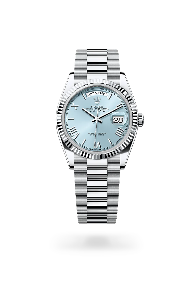 Rolex Day-Date 36 in Platinum with a Ice blue dial, Fluted bezel, President, semi-circular three-piece links bracelet