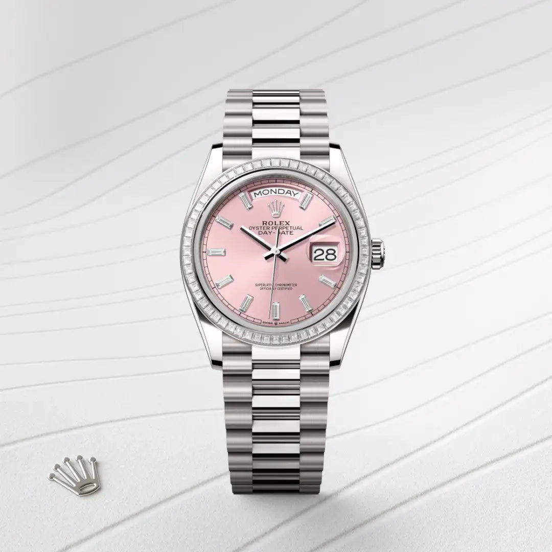 Rolex Day-Date 36 in 18 ct white gold with a Pink set with diamonds dial, Set with diamonds bezel, President, semi-circular three-piece links bracelet