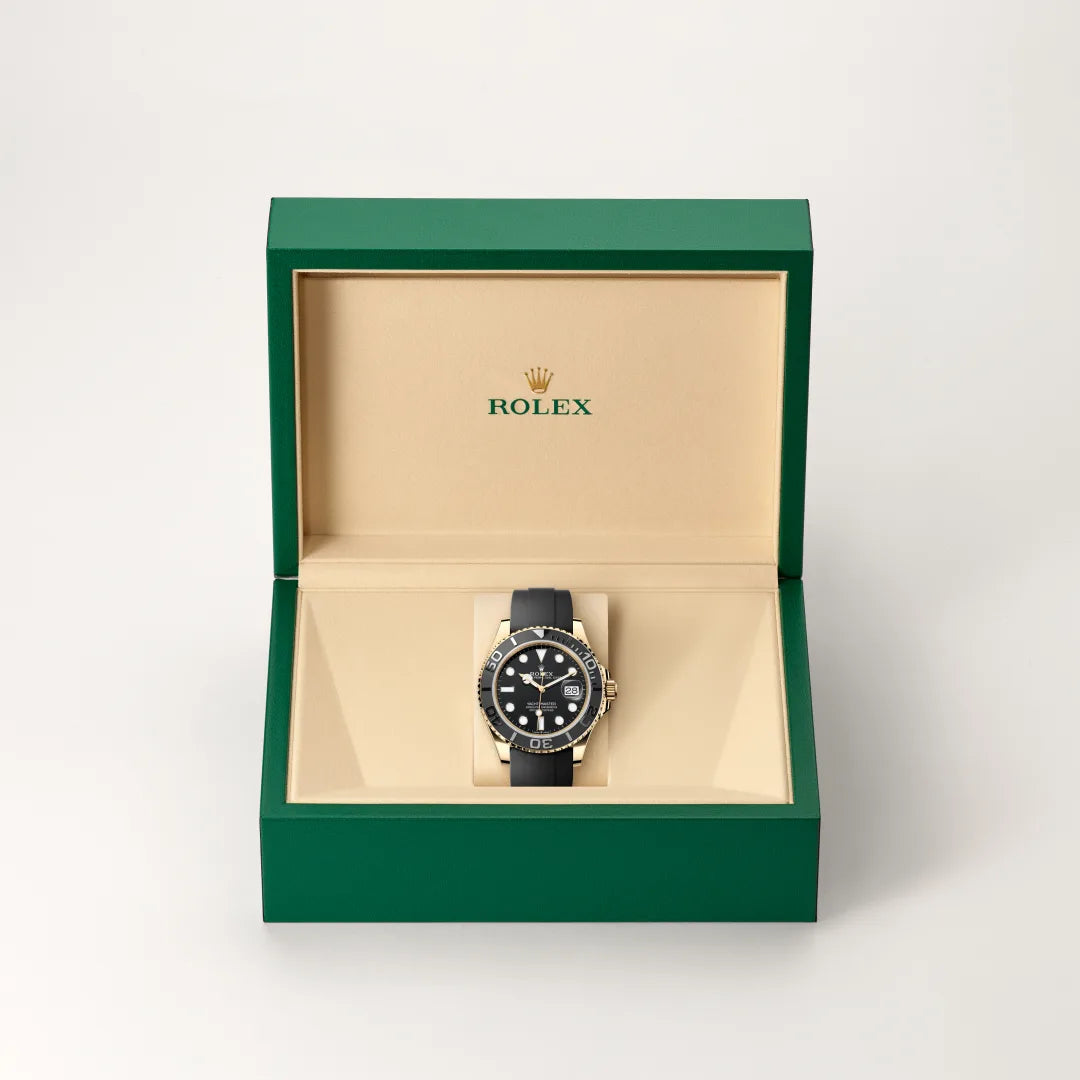 Rolex Yacht-Master 42 in 18 ct yellow gold with a Black dial, Bidirectional rotatable 60-minute graduated bezel with matt black Cerachrom insert in ceramic, polished raised numerals and graduations bezel, Oysterflex bracelet