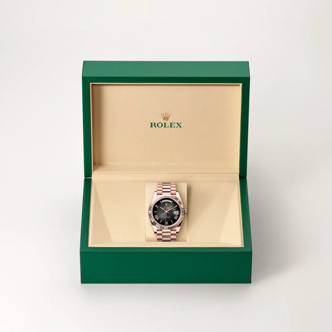 Rolex Day-Date 40 in 18 ct Everose gold with a Slate ombré dial, Fluted bezel, President, semi-circular three-piece links bracelet