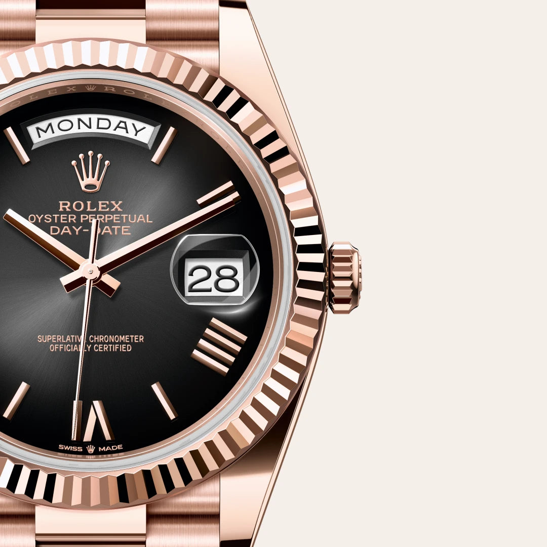 Rolex Day-Date 40 in 18 ct Everose gold with a Slate ombré dial, Fluted bezel, President, semi-circular three-piece links bracelet