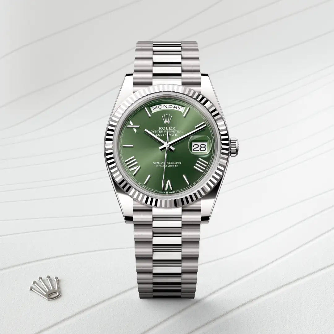 Rolex Day-Date 40 in 18 ct white gold with a Olive green dial, Fluted bezel, President, semi-circular three-piece links bracelet
