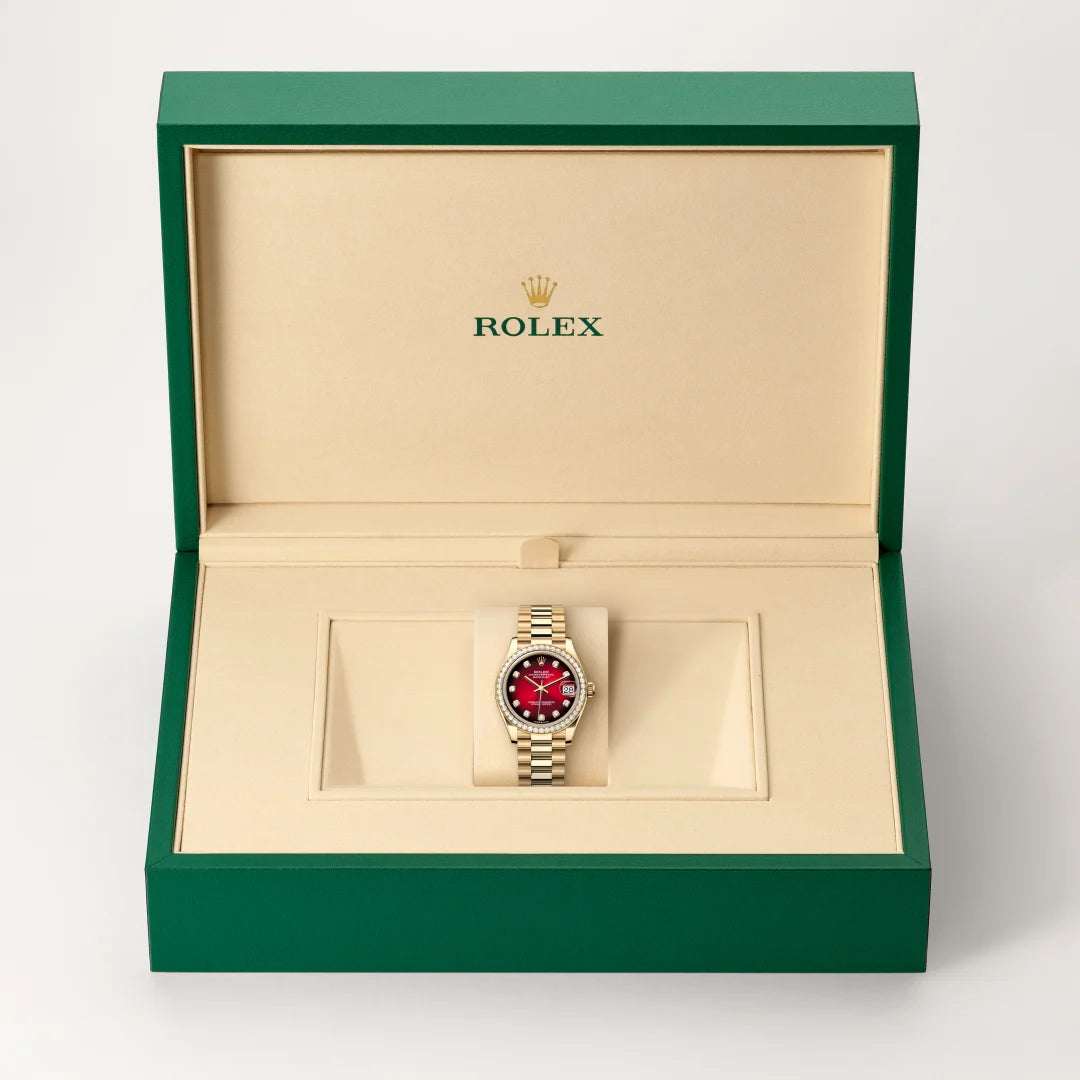 Rolex Datejust 31 in 18 ct yellow gold with a Red ombré set with diamonds dial, Diamond-set bezel, President, semi-circular three-piece links bracelet