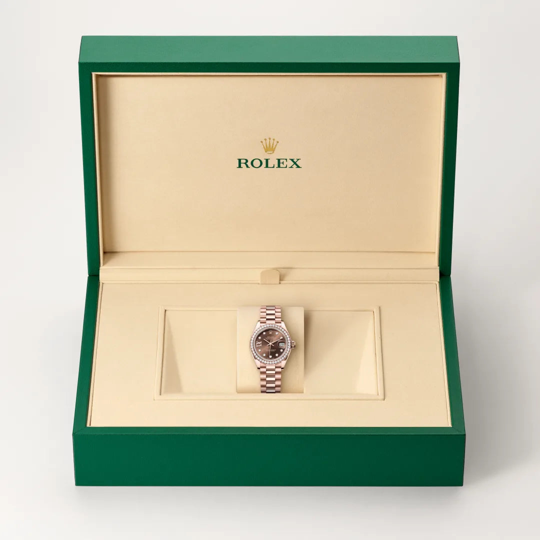 Rolex Lady-Datejust in 18 ct Everose gold with a Chocolate set with diamonds dial, Diamond-set bezel, President, semi-circular three-piece links bracelet
