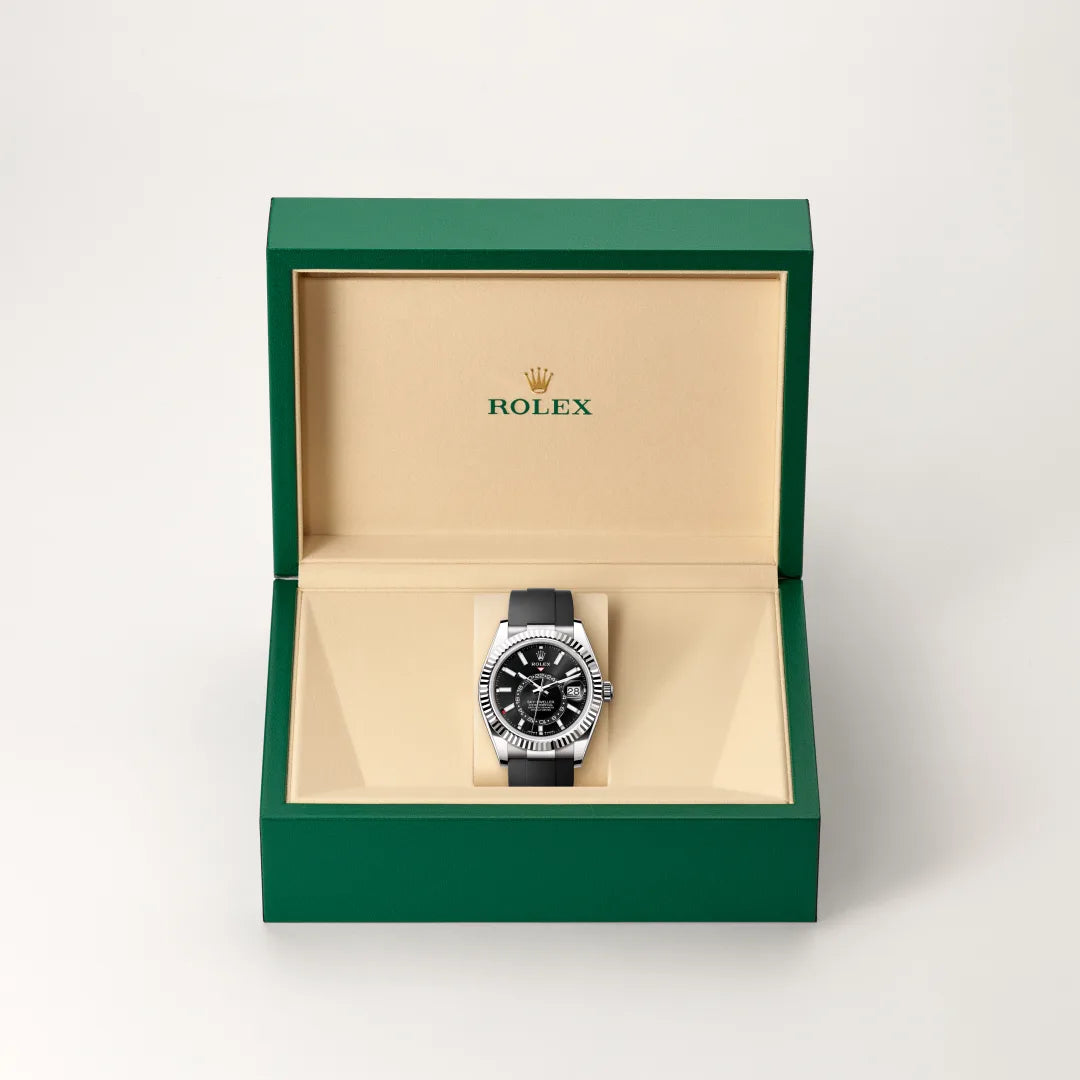 Rolex Sky-Dweller in 18 ct white gold with a Bright black dial, Fluted, bidirectional rotatable Rolex Ring Command bezel, Oysterflex bracelet