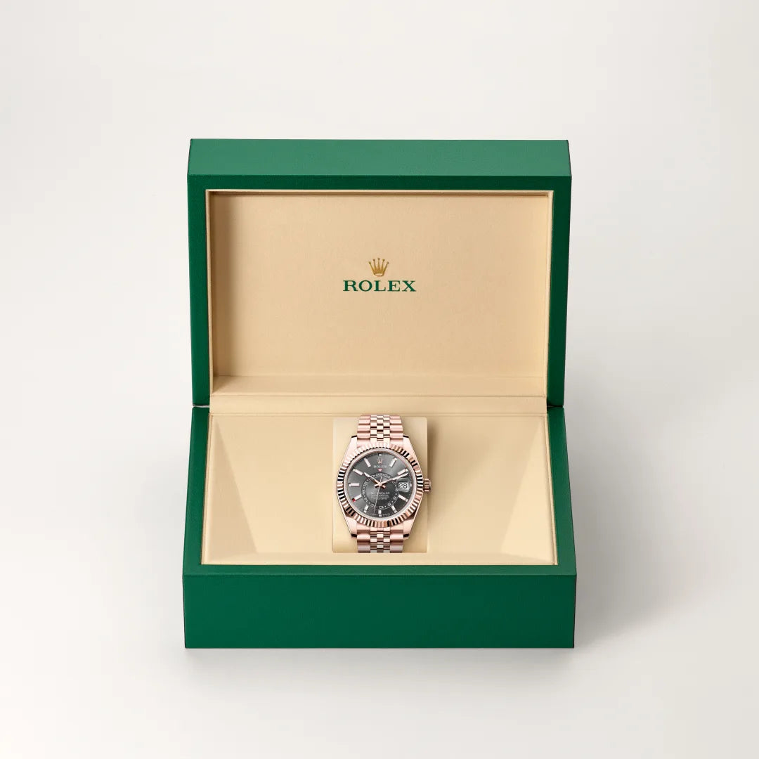 Rolex Sky-Dweller in 18 ct Everose gold with a Slate dial, Fluted, bidirectional rotatable Rolex Ring Command bezel, Jubilee, five-piece links bracelet