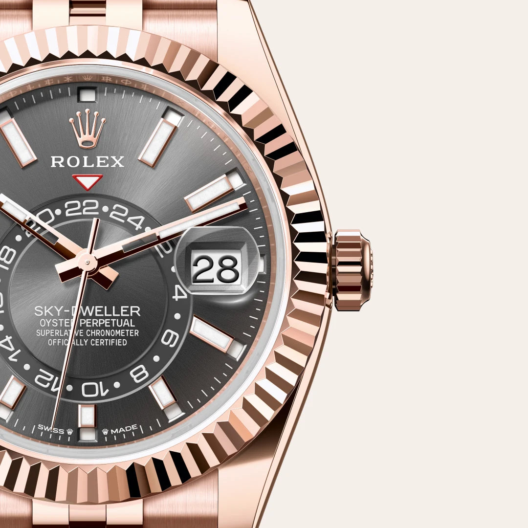 Rolex Sky-Dweller in 18 ct Everose gold with a Slate dial, Fluted, bidirectional rotatable Rolex Ring Command bezel, Jubilee, five-piece links bracelet