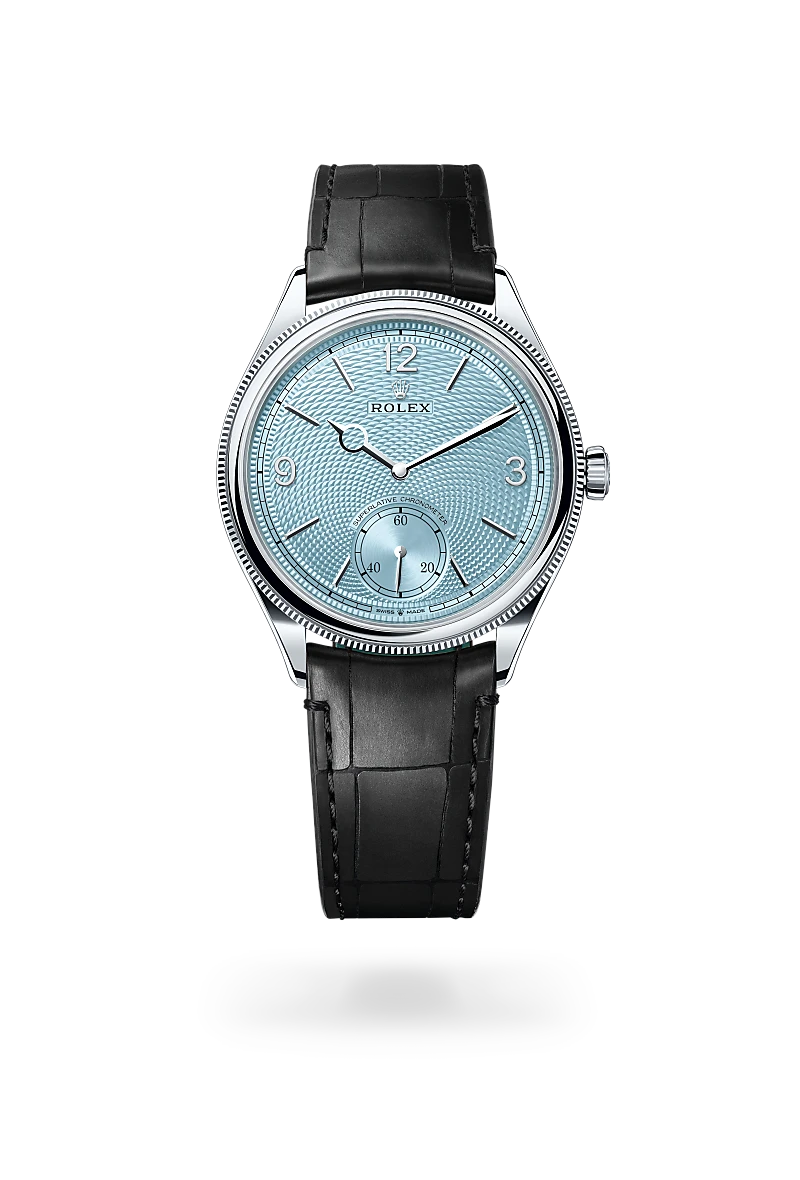 Rolex 1908 in Platinum with a Ice blue, rice-grain motif dial, Domed and fluted bezel, Leather strap bracelet