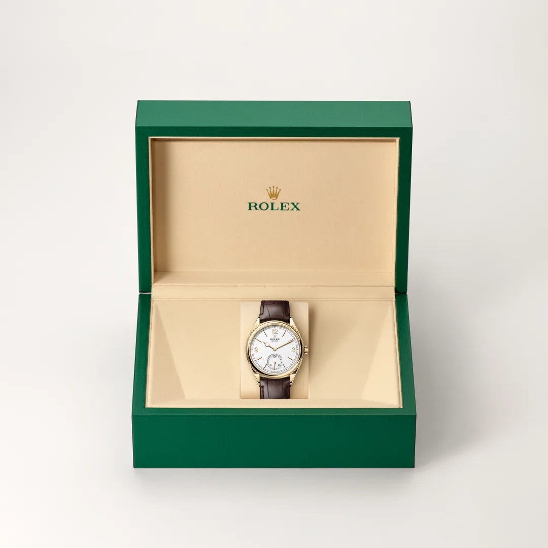 Rolex 1908 in 18 ct yellow gold with a Intense white dial, Domed and fluted bezel, Leather strap bracelet