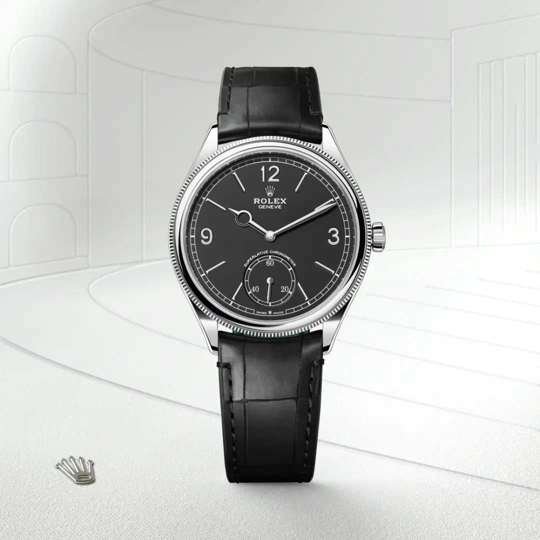 Rolex 1908 in 18 ct white gold with a Intense black dial, Domed and fluted bezel, Leather strap bracelet