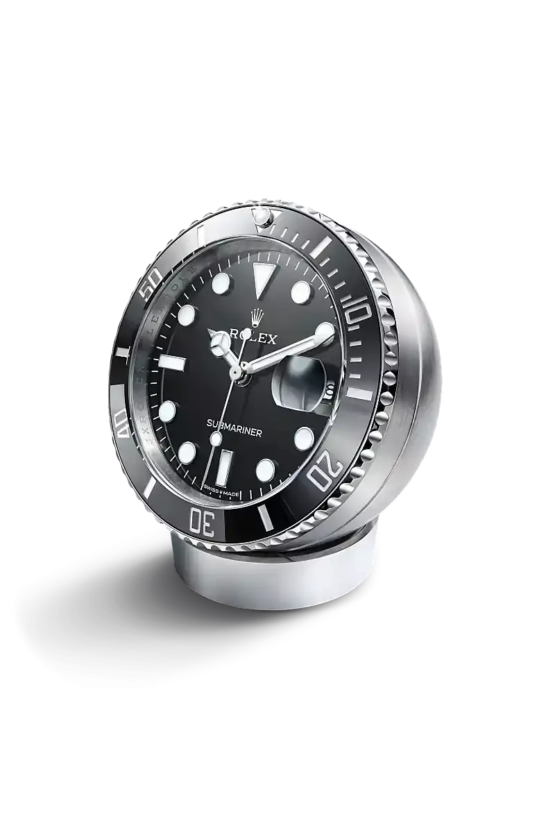 Rolex Submariner Date desk clock in Stainless steel with a Black lacquer dial, Fixed 60-minute graduated, scratch-resistant Cerachrom insert in black ceramic bezel