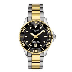 Tissot Seastar 1000 Watch with a 36mm stainless steel case. The watch features a black date dial and black bezel with yellow gold PVD coated details and is fitted onto a stainless steel and yellow gold PVD coated bracelet.