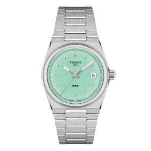 Tissot PRX Watch with a 35mm stainless steel case. The watch features mint green date dial, smooth bezel and is fitted on to a stainless steel bracelet.