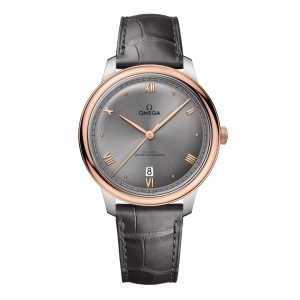 Omega De Ville Prestige Co-Axial Master Chronometer Watch with a 40mm stainless steel case. The watch features a grey date dial with rose gold details, 18ct rose golld smooth bezel and is fitted onto grey lather strap.